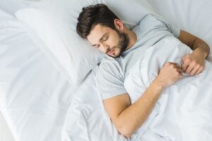 Man sleeping peacefully, viewed from above